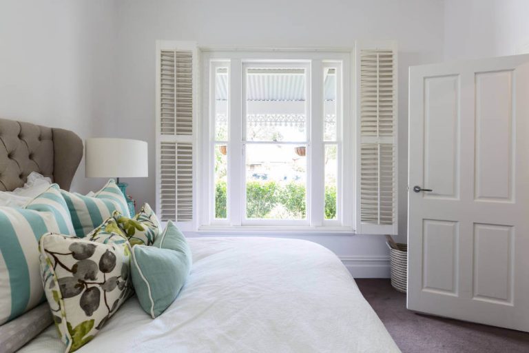 Sash-window-with-plantation-shutters