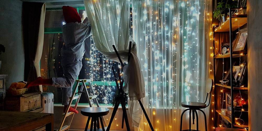 Women Decorating Window