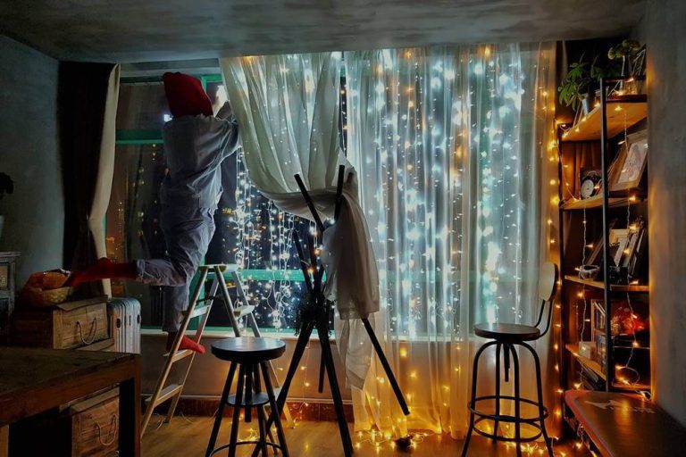 Women Decorating Window
