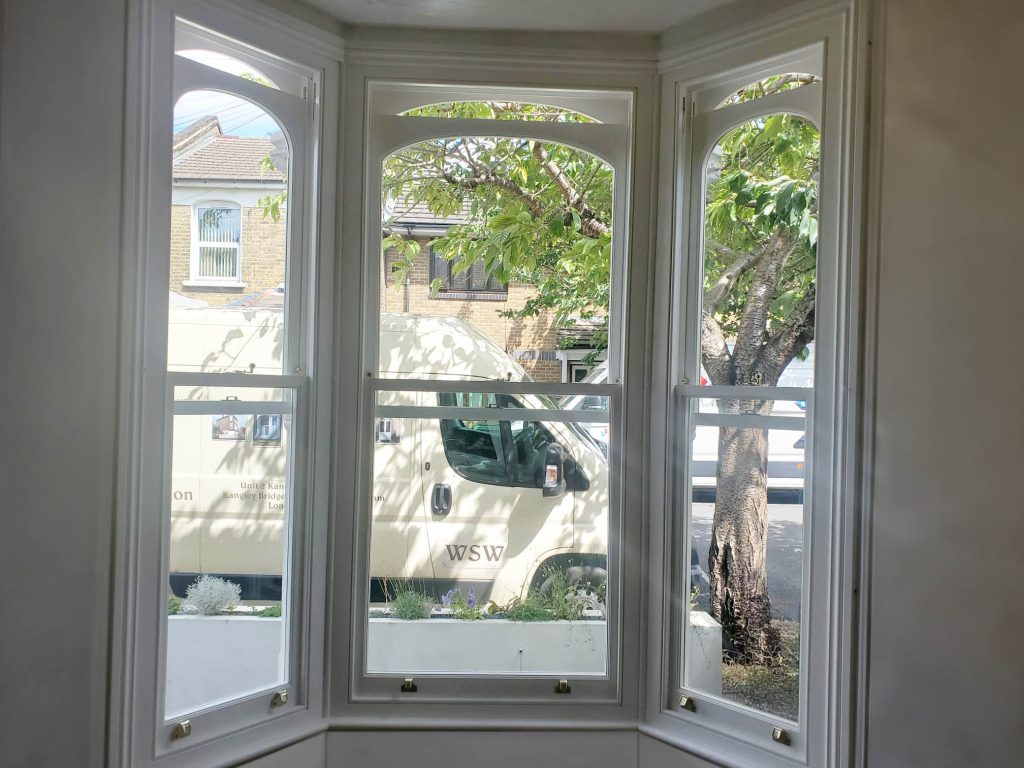 Sash windows seen from inside at a property in Peckham, SE15