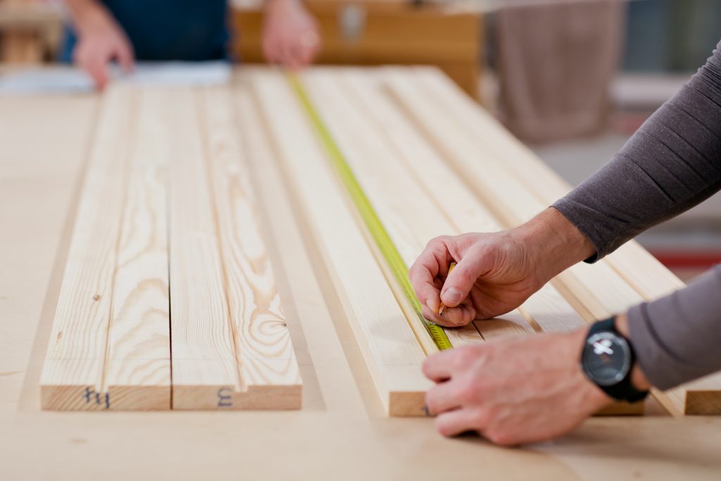 Workman measuring-wood for sash window replacements