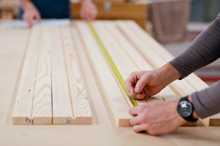 Workman measuring-wood for sash window replacements
