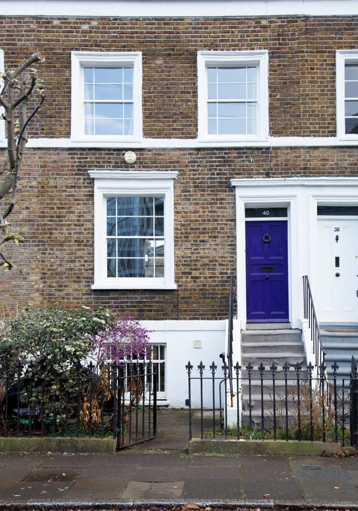Terraced house front with sash windows