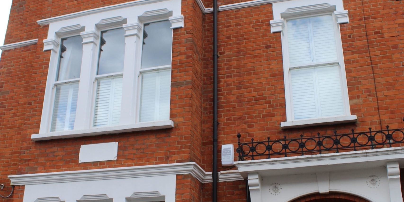 Three storey house with double glazed sash windows - 126 Drakefield Road, London