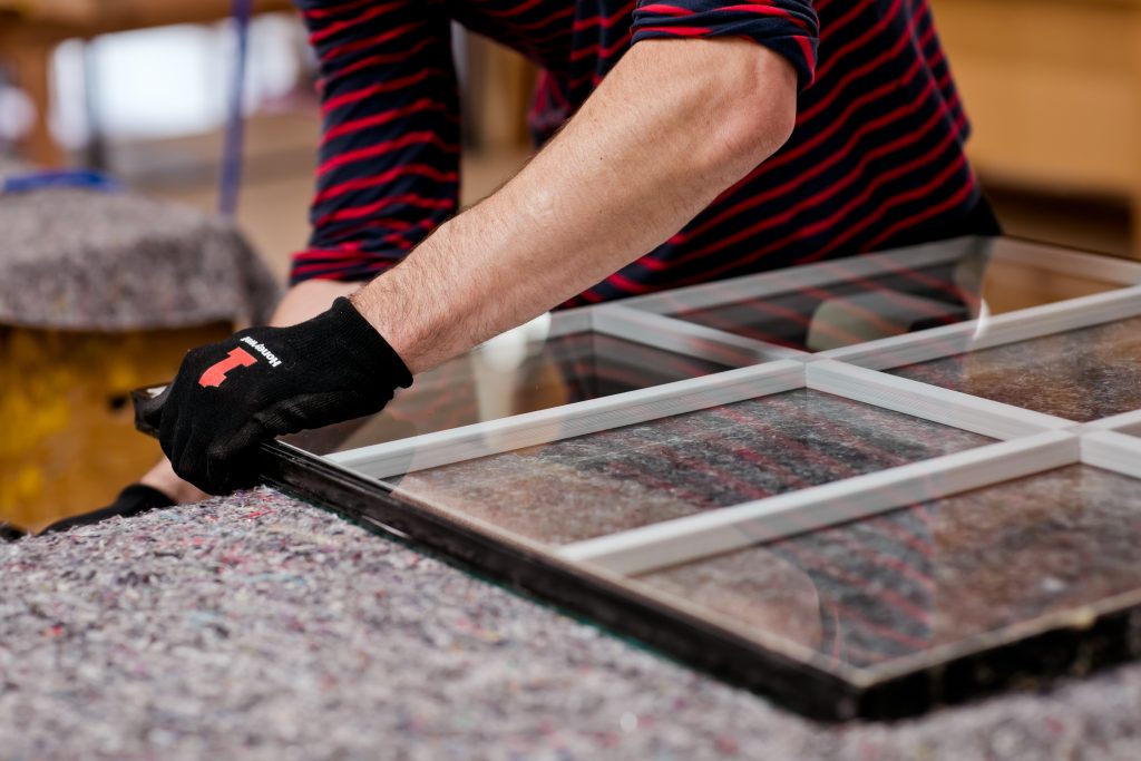 Workman preparing double glazed windows