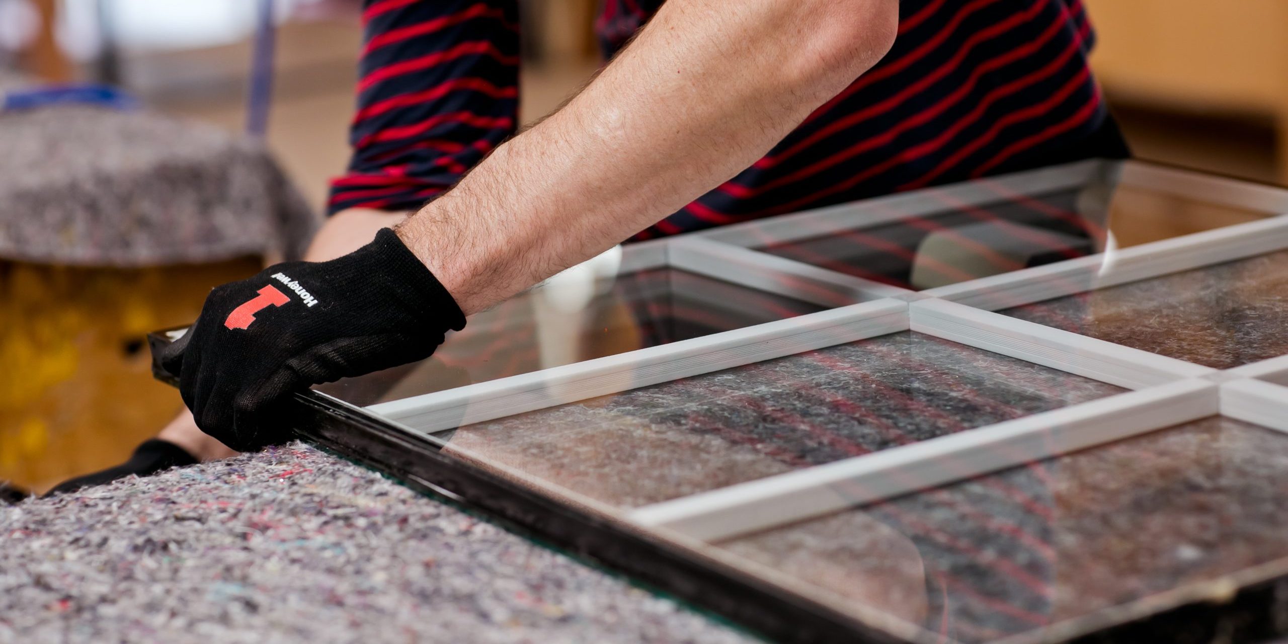 Workman preparing double glazed windows