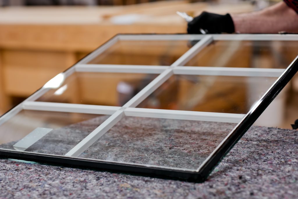 Workman preparing double glazed windows