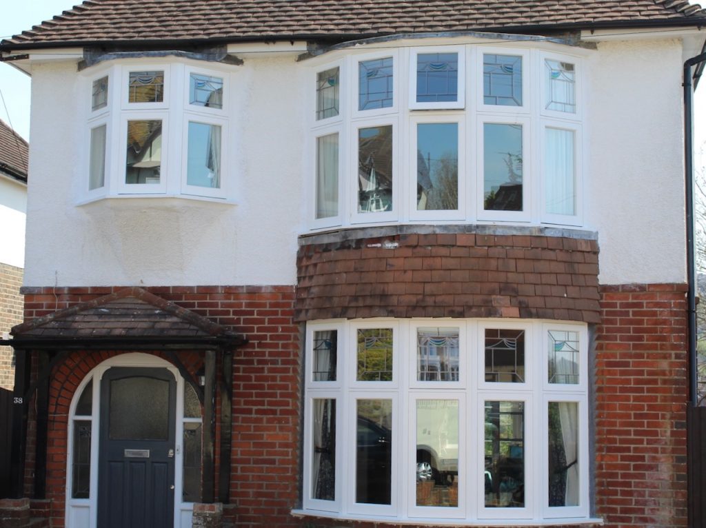 Detached house with casement windows
