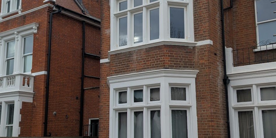 House with replacement bay windows House with replacement bay windows