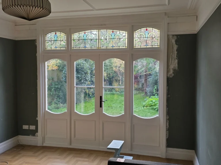 Replacement French doors with stained glass installed in Brixton