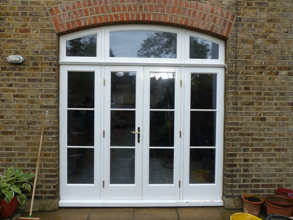 External view of curved timber French doors