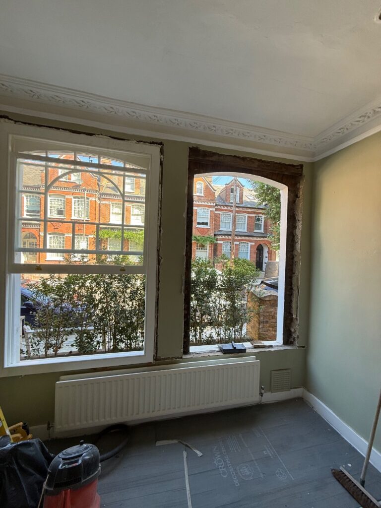 Inside view of the process of replacing a timber sash window
