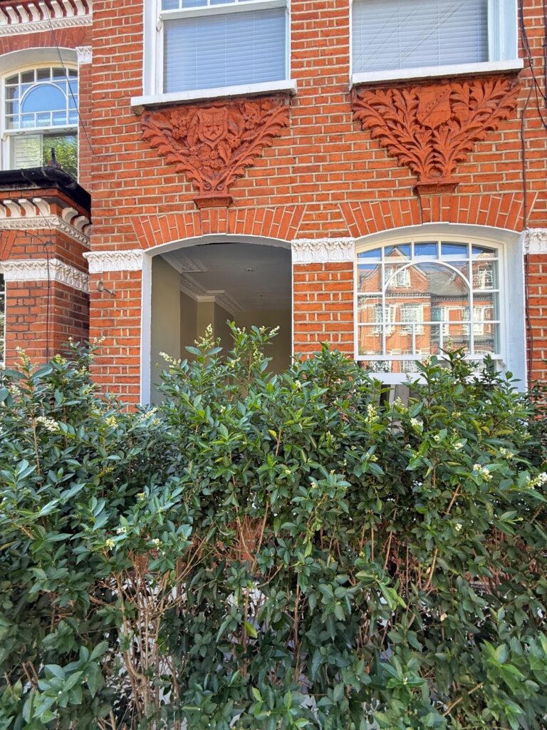 External view of in progress replacement of sash window