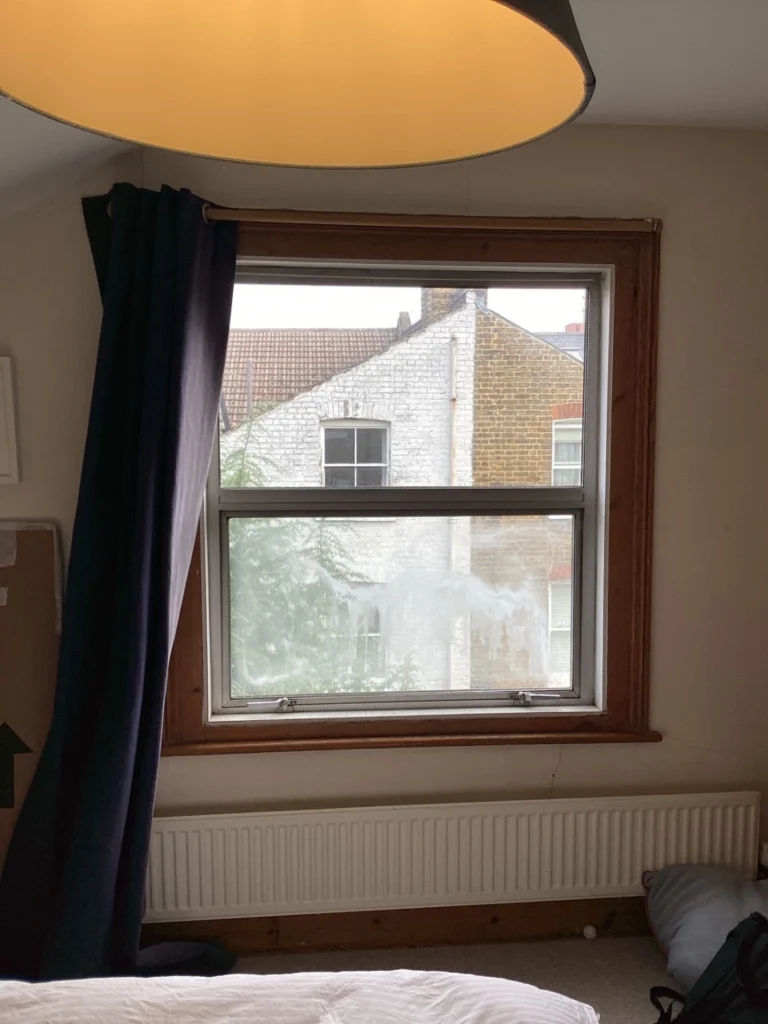 Before replacement with new timber sash window