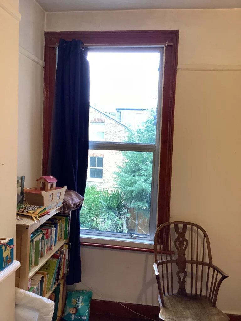 Existing aluminium window to be replaced with timber sash window
