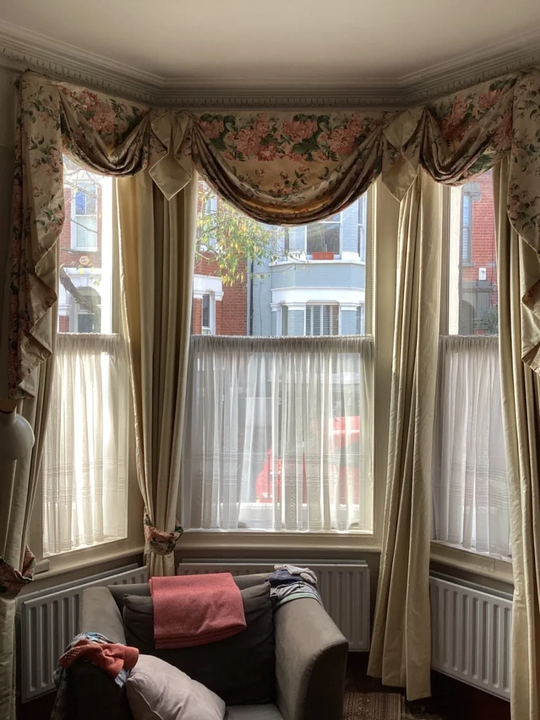 Bay window with non-original aluminium casements in place