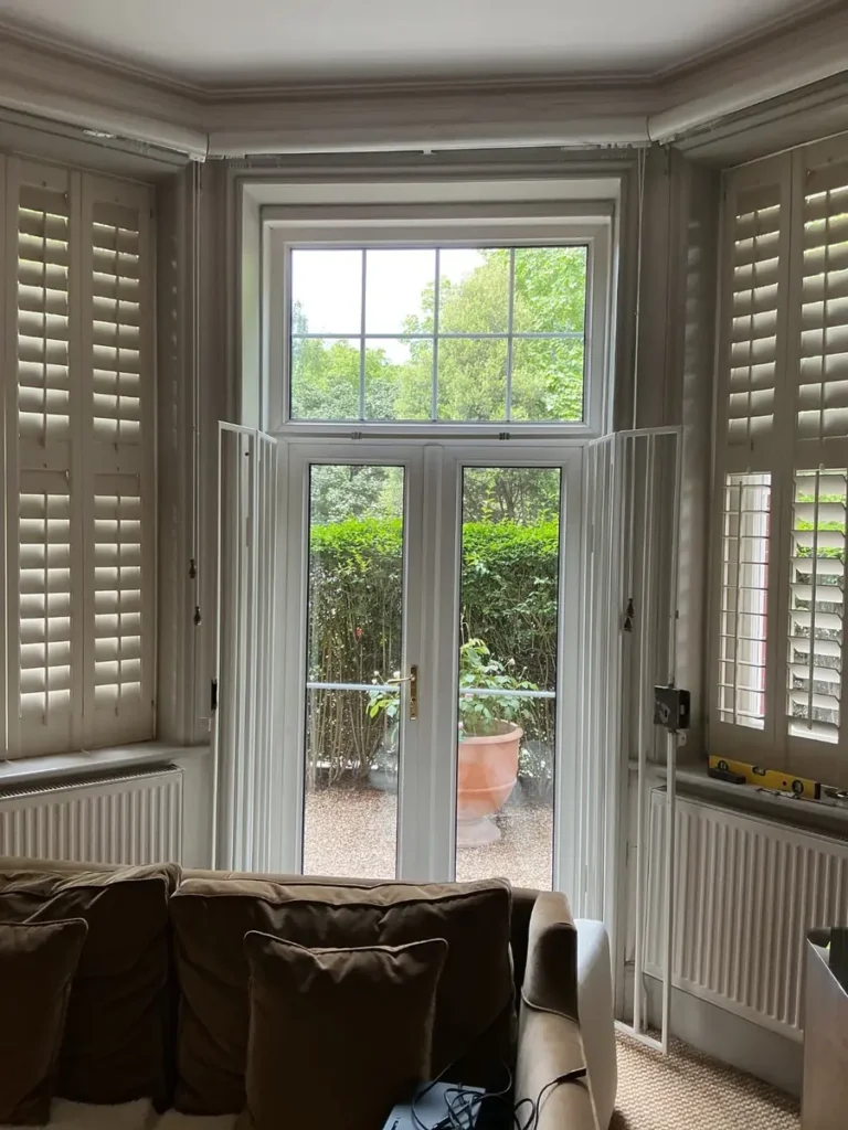 Old uPVC French doors before replacement in a Battersea mansion flat