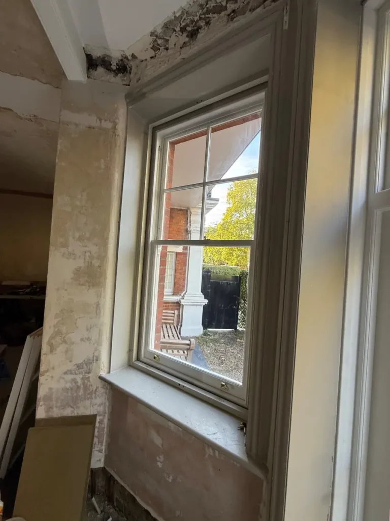 New double glazed sash window seen from inside, Battersea mansion flat