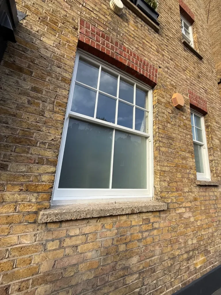 New timber sash window in a Prince of Wales Drive mansion block, Battersea
