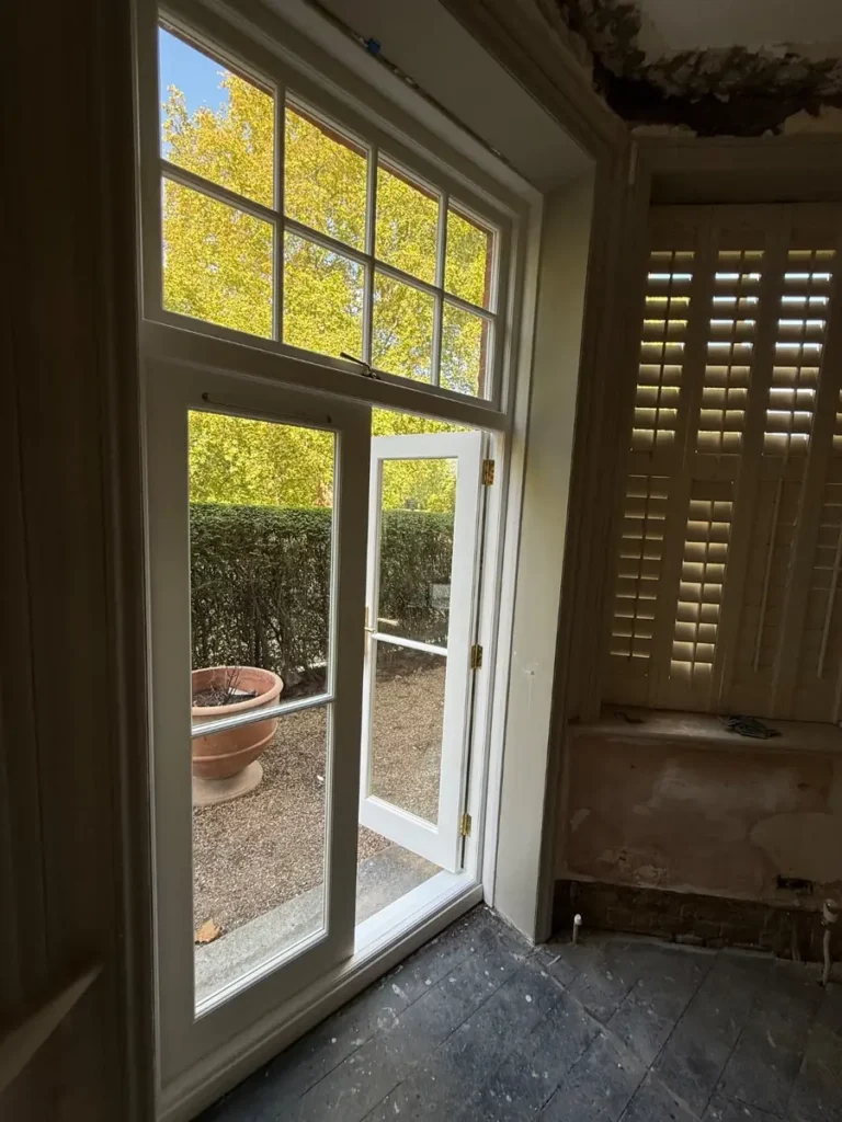 New timber French doors and fanlight seen from inside, Battersea SW11